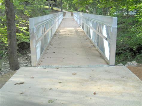 fabricated aluminum marine access and pedestrian bridge solutions|custom made trail bridges.